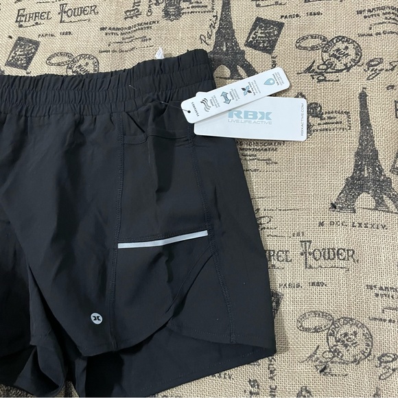 RBX Active Women'S Athletic Relaxed Fit Quick Dry Stretch Woven Running Short - Picture 4 of 11